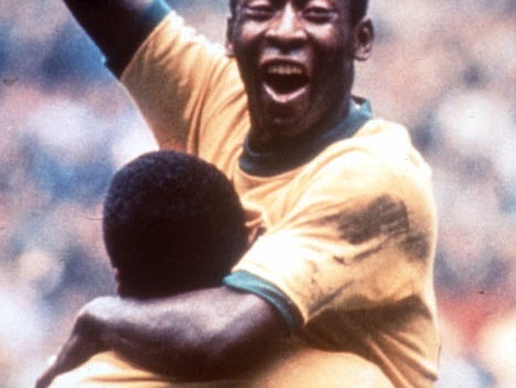 Pele celebrating a goal with a teammate